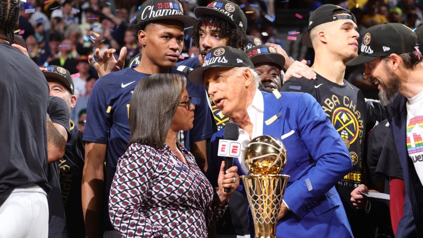 Nuggets owner Stan Kroenke talks to Lisa Salters after winning Game Five of the 2023 NBA Finals against the Miami Heat on June 12, 2023 at Ball Arena in Denver, Colorado.