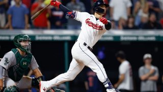 CLEVELAND, OH – JUNE 20: Andres Gimenez #0 of the Cleveland Guardians hits a game-winning single off Trevor May #65 of the Oakland Athletics during the tenth inning at Progressive Field on June 20, 2023 in Cleveland, Ohio. (Photo by Ron Schwane/Getty Images)