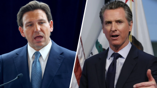 DeSantis ratchets up feud with Newsom and dares California governor to take on Biden in 2024.