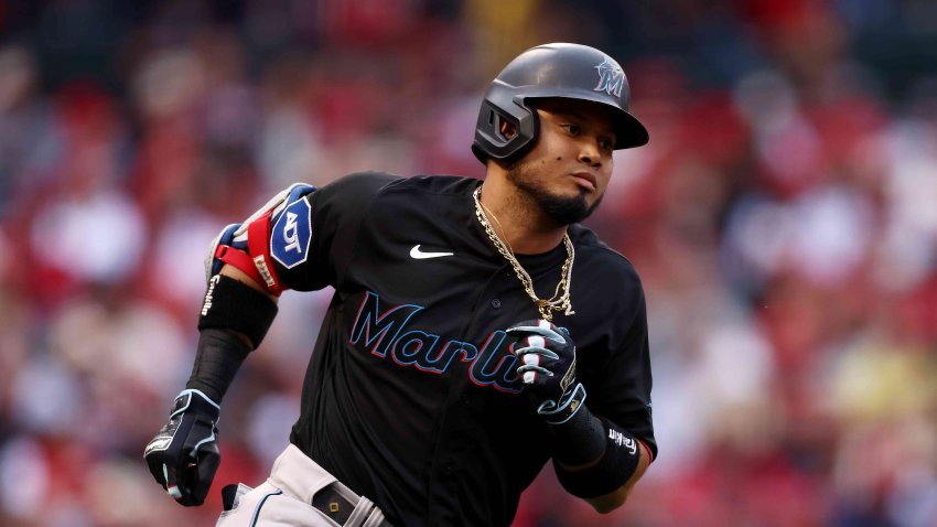 Luis Arraez #3 of the Miami Marlins runs to first base during the first inning against the Los Angeles Angels at Angel Stadium of Anaheim on May 26, 2023 in Anaheim, California.