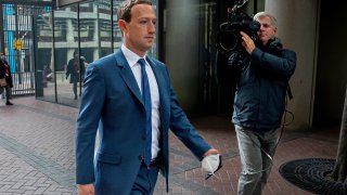 Mark Zuckerberg, chief executive officer of Meta Platforms Inc., left, arrives at federal court in San Jose, California, US, on Tuesday, Dec. 20, 2022.