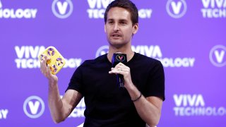 Co-founder and CEO of Snap Inc. Evan Spiegel holds up a Pixy drone while speaking during the Viva Technology conference dedicated to innovation and startups, at the Porte de Versailles exhibition center in Paris, France June 17, 2022.