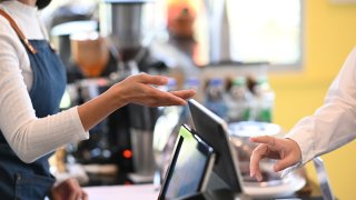 Do You Always Need to Tip 20%? Here’s How Much an Etiquette Expert Says to Leave at Restaurants, Hotels and More