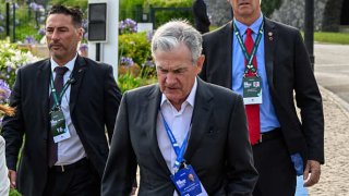 Jerome Powell, Chair of the Federal Reserve of the United States, is followed by security guards at the 2023 European Central Bank Forum on Central Banking on June 27, 2023, in Sintra, Portugal.