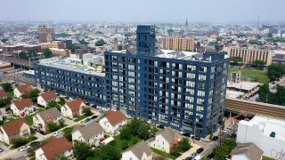 An aerial image of the Poplar Building near Northern Liberties, Philadelphia. The building previously contained office and warehouse for Strawbridge & Clothier in the 20th century. Post Brothers completed the conversion in 2018.
