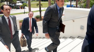 Attorneys for former President Donald Trump Chris Kise (C) and Todd Blanche (R) arrive at The Alto Lee Adams Sr. United States Courthouse on July 18, 2023 in Fort Pierce, Florida.