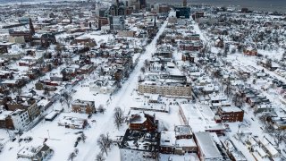 Snow blankets the city in this aerial drone photograph in Buffalo, New York, on December 25, 2022.