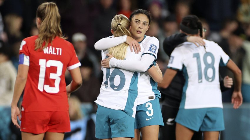 New Zealand’s Claudia Bunge, right, and New Zealand’s Jacqui Hand embrace after the Women’s World Cup Group A soccer match between New Zealand and Switzerland in Dunedin, New Zealand, Sunday, July 30, 2023.