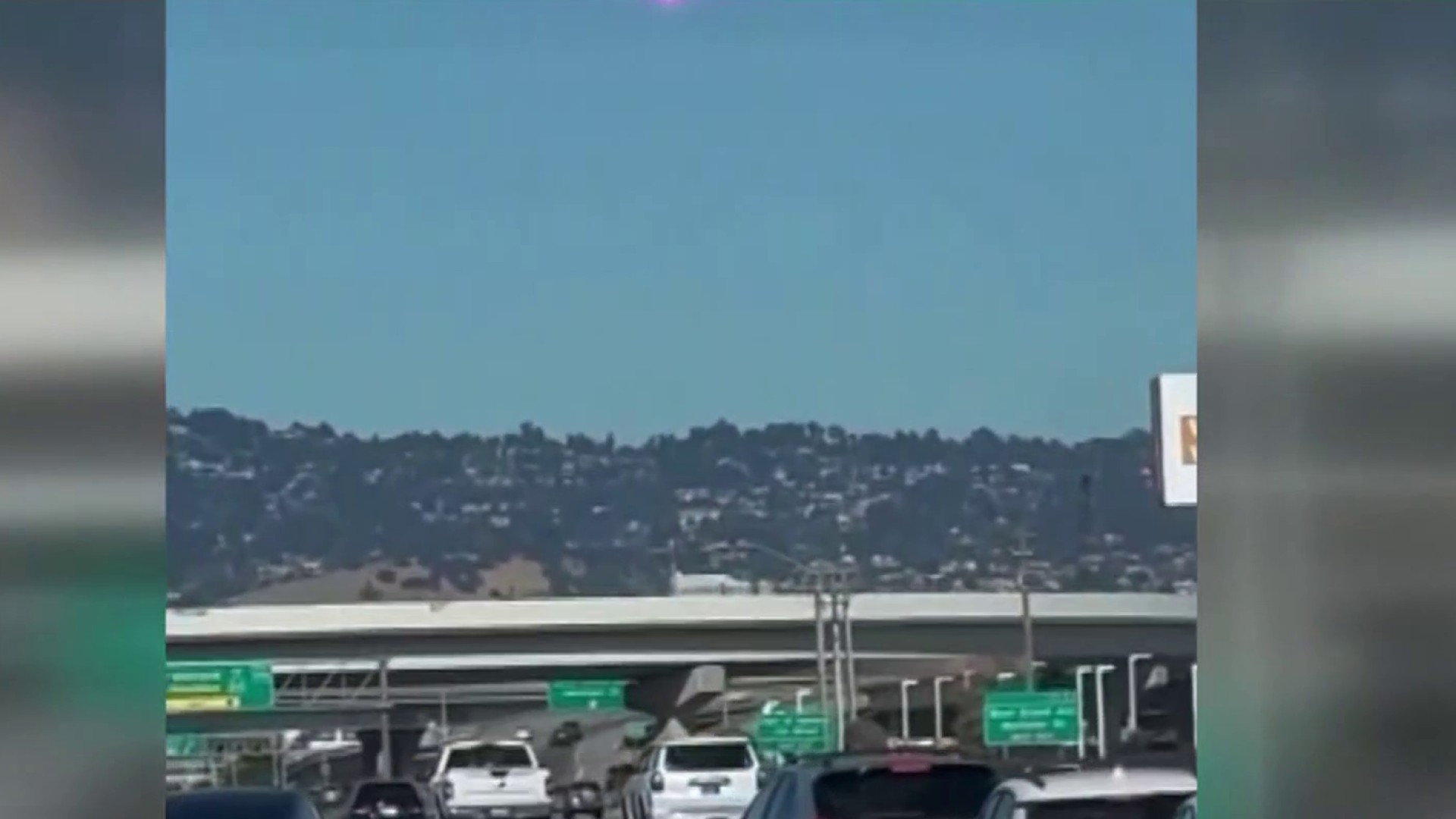 Video shows naked woman running with a gun near Bay Bridge toll plaza image image picture