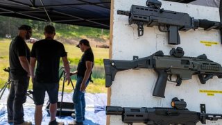 People fire an assortment of guns at the annual Machine Gun Shoot sponsored by Shooters Gauntlet in Monroe, Pennsylvania, June 3, 2023. The shoot, which has been held since 2016, lets gun enthusiasts and others shoot machine guns at targets in a controlled and secure wooded location.