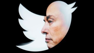 An effigy of Elon Musk is seen on a mobile device with the Twitter logo in this photo illustration on 23 July, 2023 in Warsaw, Poland.