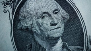 The likeness of George Washington is seen on a U.S. one dollar bill, Monday, March 13, 2023, in Marple Township, Pa.