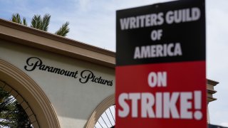 Members of the The Writers Guild of America picket outside Paramount Pictures