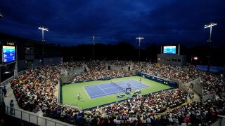 Taro Daniel, of Japan, right, serves to Gael Monfils, of France, during the first round of the U.S. Open tennis championships, Tuesday, Aug. 29, 2023, in New York.