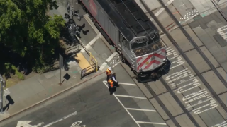 Authorities in Redwood City investigate a deadly collision involving a Caltrain and a pedestrian.