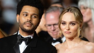 Lily-Rose Depp and Abel Makkonen Tesfaye, The Weeknd attend the "The Idol" red carpet during the 76th annual Cannes film festival at Palais des Festivals on May 22, 2023 in Cannes, France.