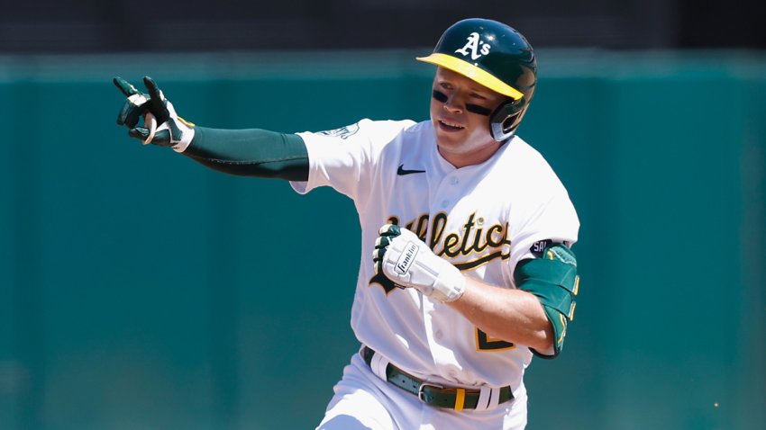 Nick Allen trots around the bases after hitting a home run against the San Francisco Giants.