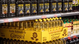 Bottles of olive oil and sunflower oil at a Mercadona SA supermarket in Barcelona, Spain.