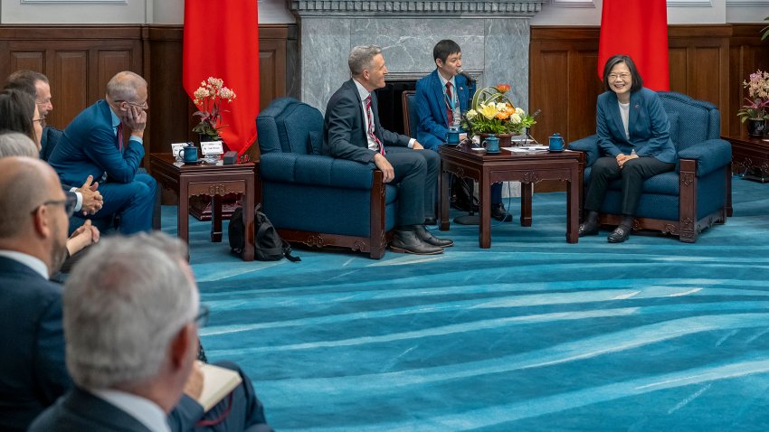 In this photo released by the Taiwan Presidential Office, Taiwan’s President Tsai Ing-wen meets with Australian lawmaker Josh Wilson, third right and other lawmakers at the Presidential Office in Taipei, Taiwan, Tuesday, Sept. 26, 2023.