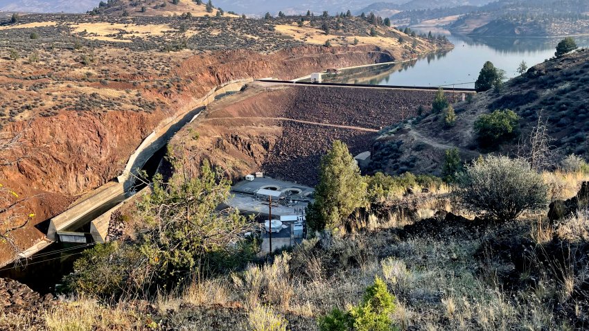 The Iron Gate Dam is seen in Hornbrook, Calif., Sept. 17, 2023. The dam is one of a series of four dams along the Klamath River which are part of the largest dam removal project in United States history. Now underway along the Oregon border, the process won’t conclude until the end of next year with the help of heavy machinery and explosives.