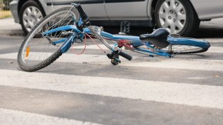 Blue bike on a pedestrian crossing after fatal incident with a car