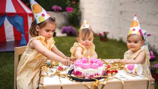 Babies celebrating a birthday.