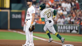 HOUSTON, TEXAS – SEPTEMBER 12: Shea Langeliers #23 of the Oakland Athletics hits a two run home run during the first inning against the Houston Astros at Minute Maid Park on September 12, 2023 in Houston, Texas. (Photo by Carmen Mandato/Getty Images)