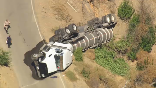 A big-rig on its side after crashing in Sunol.