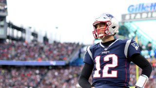 Tom Brady #12 of the New England Patriots looks on during the game against the Miami Dolphins at Gillette Stadium on Dec. 29, 2019.