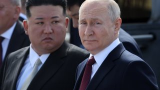 TSIOLKOVSKY, RUSSIA – SEPTEMBER 13: (RUSSIA OUT) Russian President Vladimir Putin (R) and North Korean leader Kim Jong-un (L) visit a construction site of the Angara rocket launch complex on September 13, 2023 in Tsiolkovsky, Russia. North Korean leader Kim Jong-un is in Russia for talks with Russian President Putin. (Photo by Contributor/Getty Images)