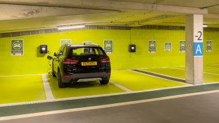Charging points at an underground car park in England. The number of EVs on our roads is increasing.