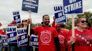 Striking United Auto Workers (UAW) members from the General Motors Lansing Delta Plant picket in Delta Township, Michigan September 29, 2023.