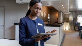 Experts predict the role of hotel concierge is a profession example of where analyzing decades of data and experience can allow an AI assistant to guide human workers to the best decisions.