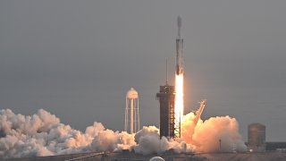 A SpaceX Falcon Heavy rocket with the Psyche spacecraft launches from NASA’s Kennedy Space Center in Cape Canaveral, Florida, on October 13, 2023.