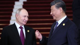 A pool photograph distributed by Russian state owned agency Sputnik showing Russia’s President Vladimir Putin and Chinese President Xi Jinping during a welcoming ceremony at the Third Belt and Road Forum in Beijing on October 17, 2023.