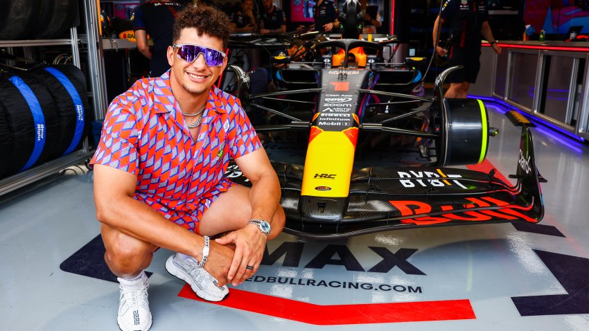 Patrick Mahomes poses for a photo outside the Red Bull Racing garage prior to the F1 Grand Prix of Miami at Miami International Autodrome on May 7, 2023 in Miami, Fla.