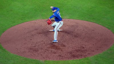 Ikon Technologies CEO and UTA Alum Throws the First Pitch at Rangers Game