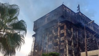 Smokes raise from the burning building of police headquarters in Ismailia, northeastern Egypt following a fire Monday, Oct. 2, 2023. A huge fire broke out early Monday in the police headquarters, injuring multiple people, the health ministry said.