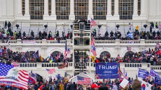FILE - Insurrectionists loyal to President Donald Trump breach the Capitol