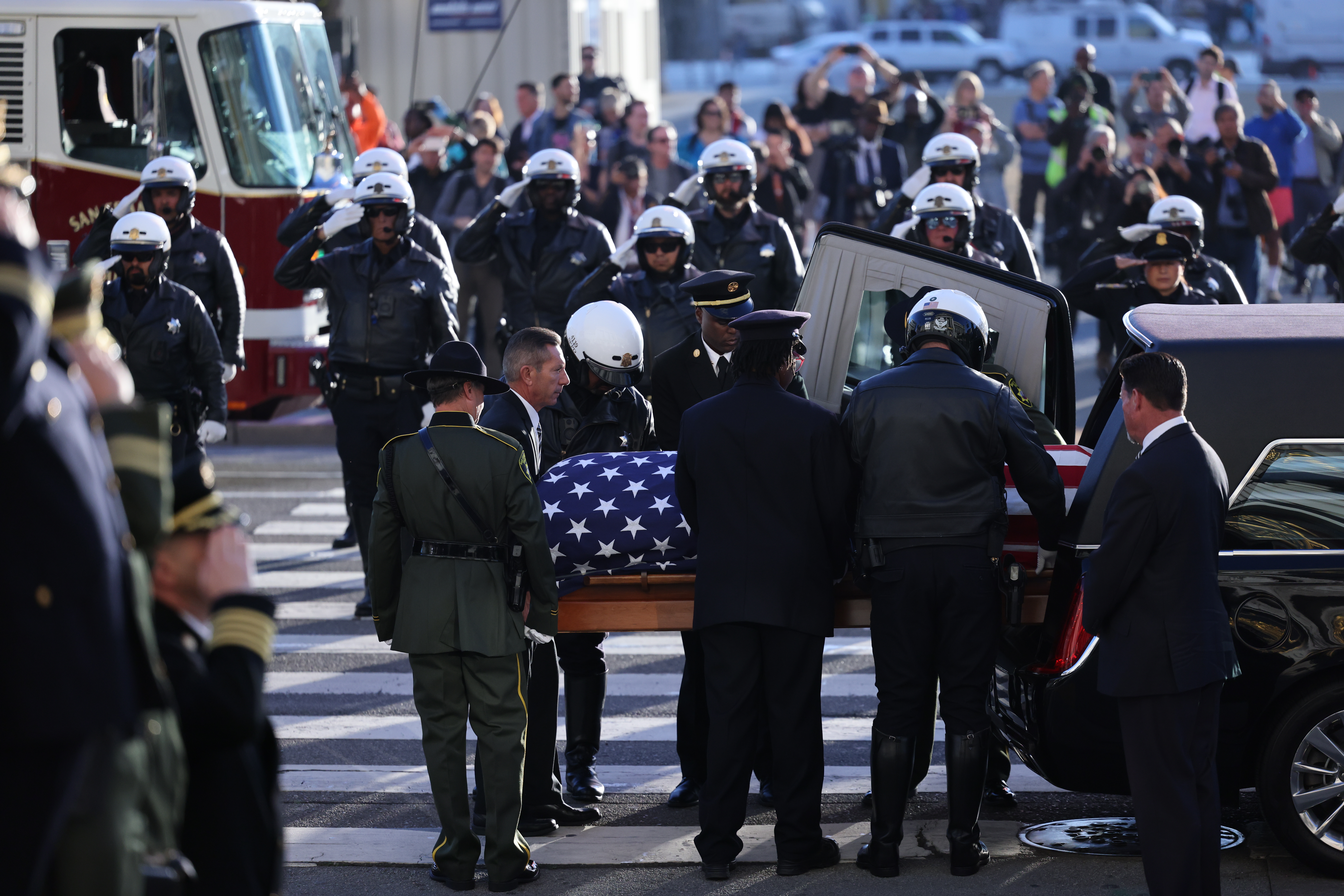 The body of Senator Dianne Feinstein is carried into City Hall for public viewing on October 4, 2023 in San Francisco, California. (Photo by Gabrielle Lurie – Pool/Getty Images)