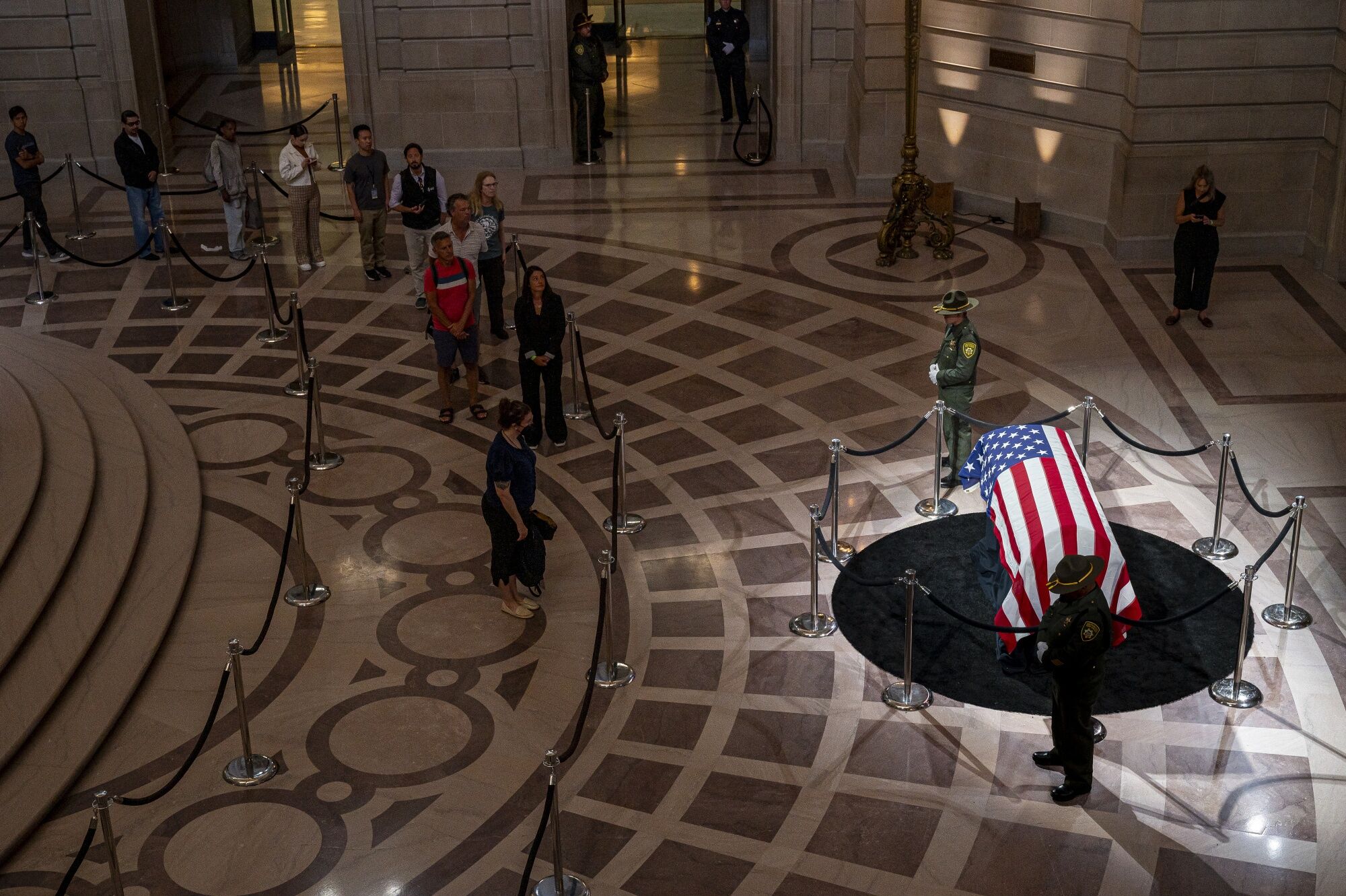 The casket of late Senator Dianne Feinstein lies in state at San Francisco City Hall in San Francisco, California, US, on Wednesday, Oct. 4, 2023. (Photographer: David Paul Morris/Bloomberg via Getty Images)