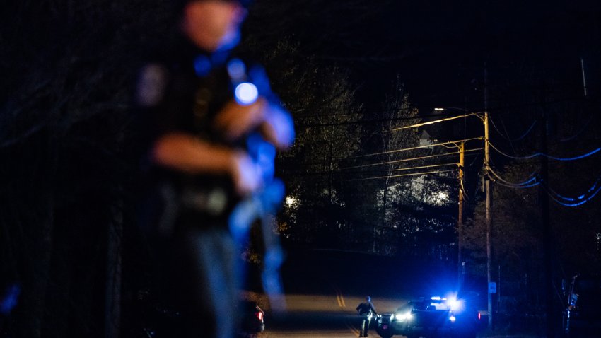 LISBON, ME – OCTOBER 27: Law enforcement members investigate at a site where a body of the suspect Robert Card is found in Lisbon, Maine, Friday, October 27, 2023. Card is believed to be the gunman who killed at least 18 people in Lewiston, Maine. (Photo by Salwan Georges/The Washington Post via Getty Images)