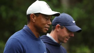 Tiger Woods of the United States and Rory McIlroy of Northern Ireland walk to the 11th fairway during a practice round prior to the 2023 Masters Tournament at Augusta National Golf Club on April 03, 2023 in Augusta, Georgia. 