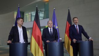 German Chancellor Olaf Scholz (C), Finance Minister Christian Lindner (R) and Economy Minister Robert Habeck give statements to the media following the weekly government cabinet meeting on November 15, 2023 in Berlin, Germany.