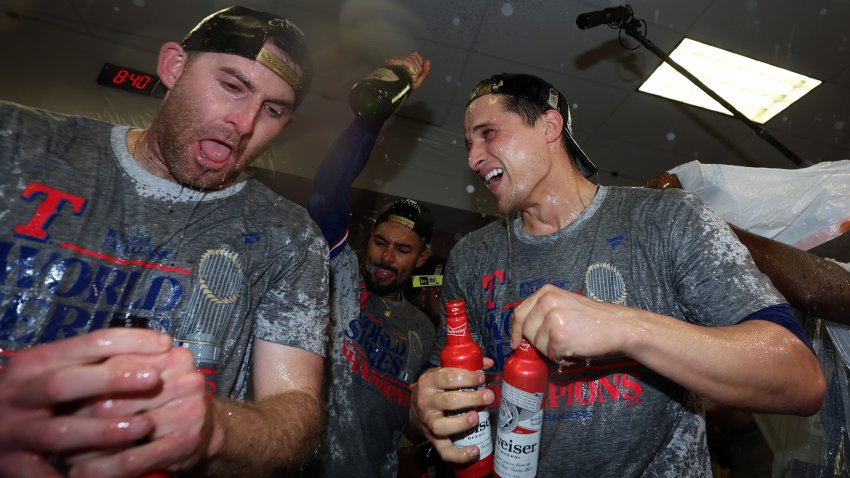 PHOENIX, ARIZONA – NOVEMBER 01: Corey Seager #5 of the Texas Rangers celebrates in the clubhouse after the Texas Rangers beat the Arizona Diamondbacks 5-0 in Game Five to win the World Series at Chase Field on November 01, 2023 in Phoenix, Arizona. (Photo by Christian Petersen/Getty Images)