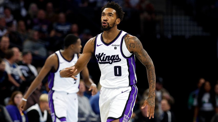 MINNEAPOLIS, MINNESOTA – NOVEMBER 24: Malik Monk #0 of the Sacramento Kings celebrates his three-point basket against the Minnesota Timberwolves in the second quarter during an NBA In-Season Tournament game at Target Center on November 24, 2023 in Minneapolis, Minnesota. NOTE TO USER: User expressly acknowledges and agrees that, by downloading and or using this photograph, User is consenting to the terms and conditions of the Getty Images License Agreement. (Photo by David Berding/Getty Images)