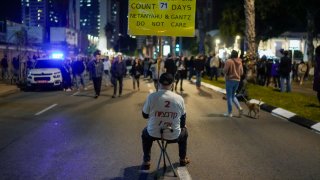 Families and supporters of Israeli hostages held by Hamas in Gaza attend a rally calling for their return, in Tel Aviv, Israel, Saturday, Dec. 16, 2023.