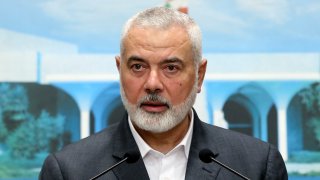 In this photo released by Lebanese government, Ismail Haniyeh, the leader of the Palestinian militant group Hamas, speaks during a press conference.