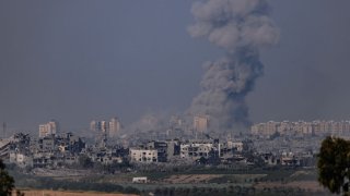 Smoke rises from an explosion in Gaza.