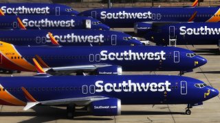 A number of Southwest Airlines Boeing 737 MAX aircraft are parked at Southern California Logistics Airport on March 27, 2019 in Victorville, California. Southwest Airlines is waiting out a global grounding of MAX 8 and MAX 9 aircraft at the airport.